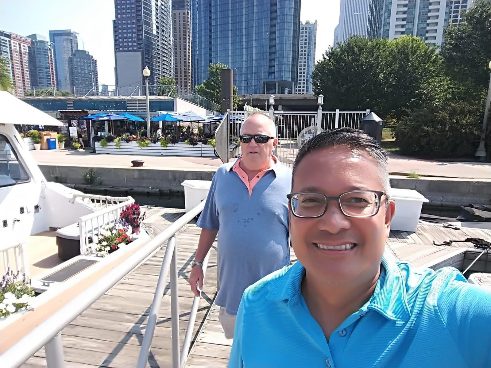 Two ISG teammates at the marina